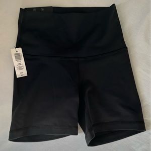 TnaLIFE™ Cheeky Hi-Rise 7" Short Black